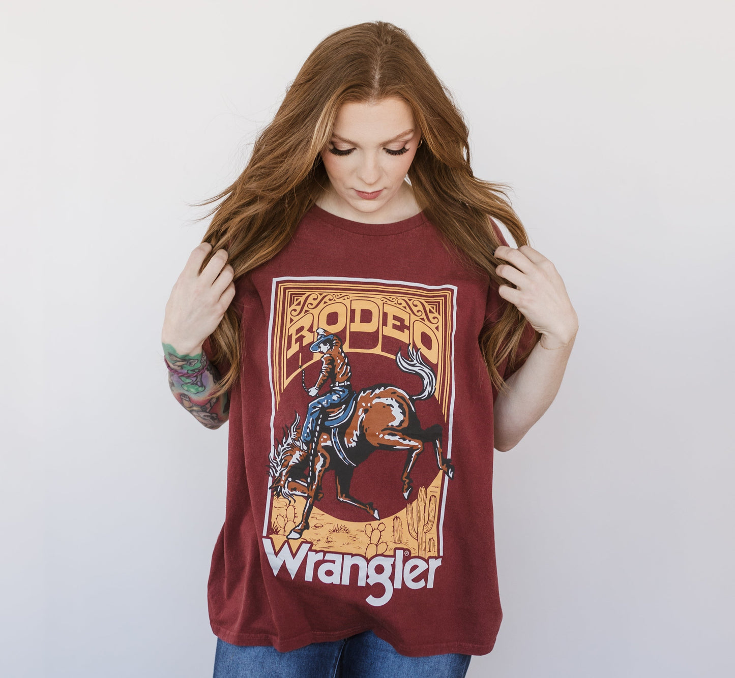 Women's Wrangler Acid Wash Graphic Oversized Tee – Retro Western Style Meets All-Day Comfort