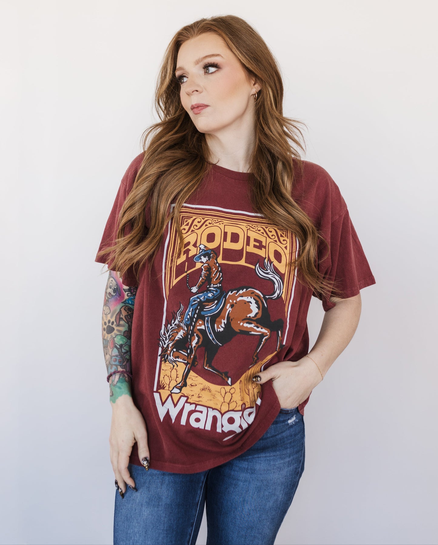 Women's Wrangler Acid Wash Graphic Oversized Tee – Retro Western Style Meets All-Day Comfort