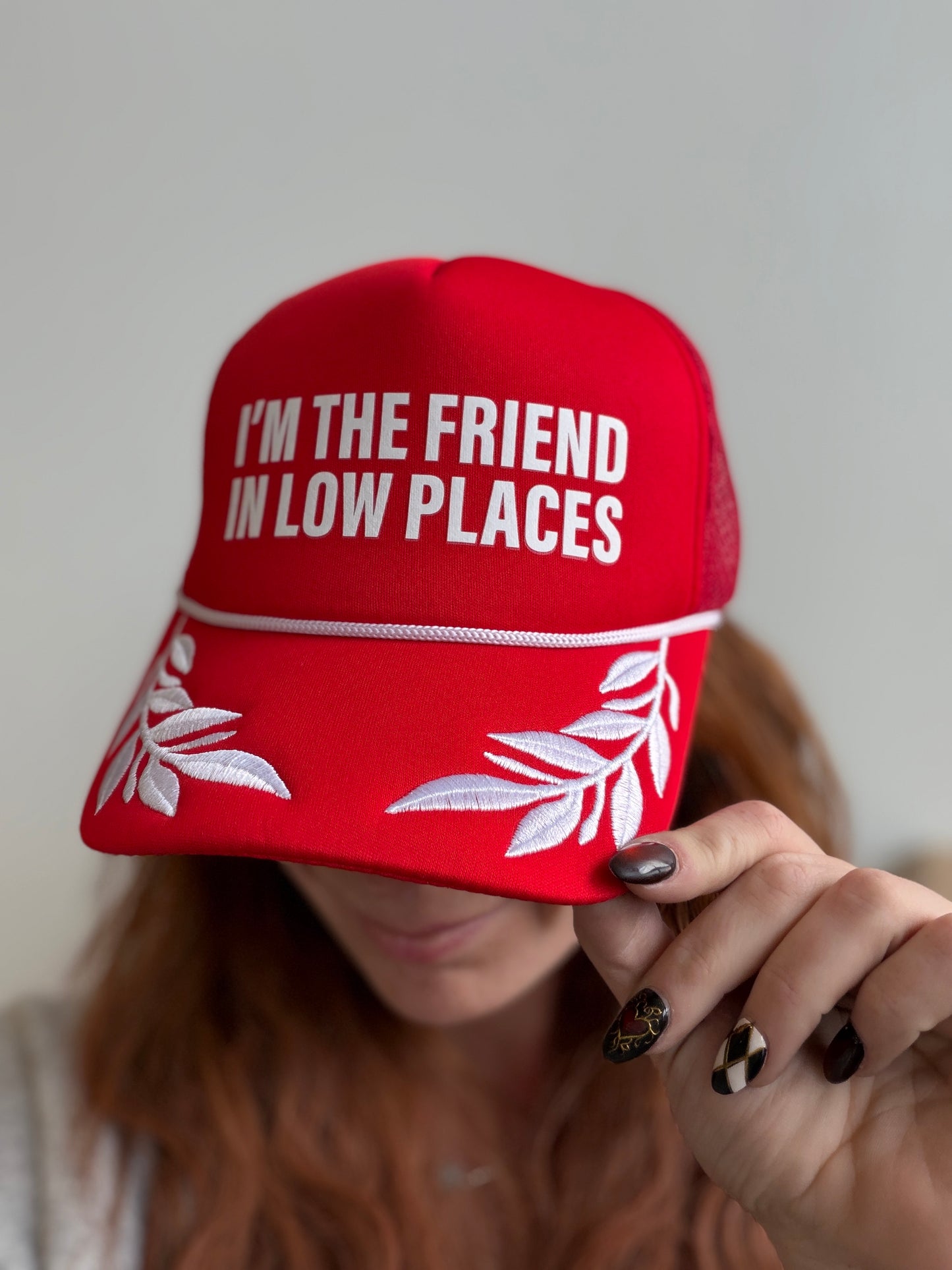 I’m the Friend in Low Places Trucker Hat
