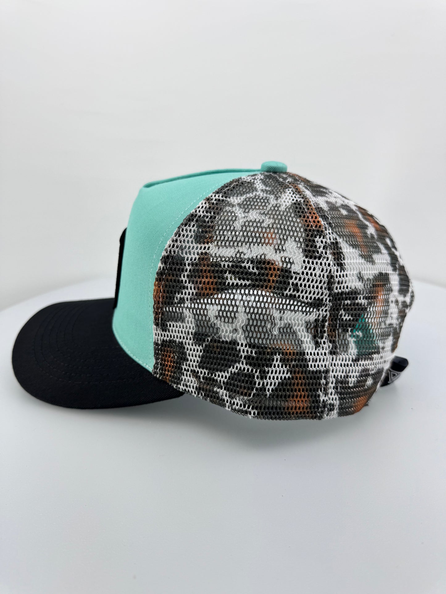 The Johnny Highland Cow Patch and Cow Print Trucker Hat