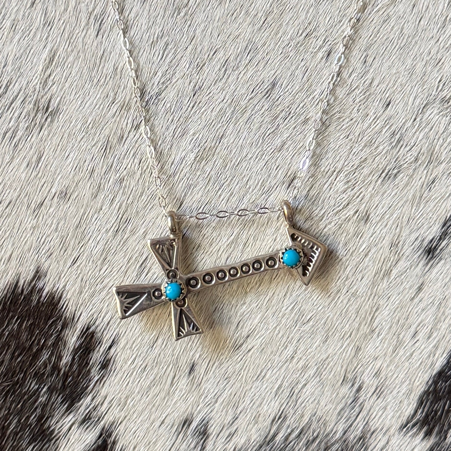 Kingman Turquoise Sterling Silver Cross Arrow Necklace – Native Made by Myra Benally