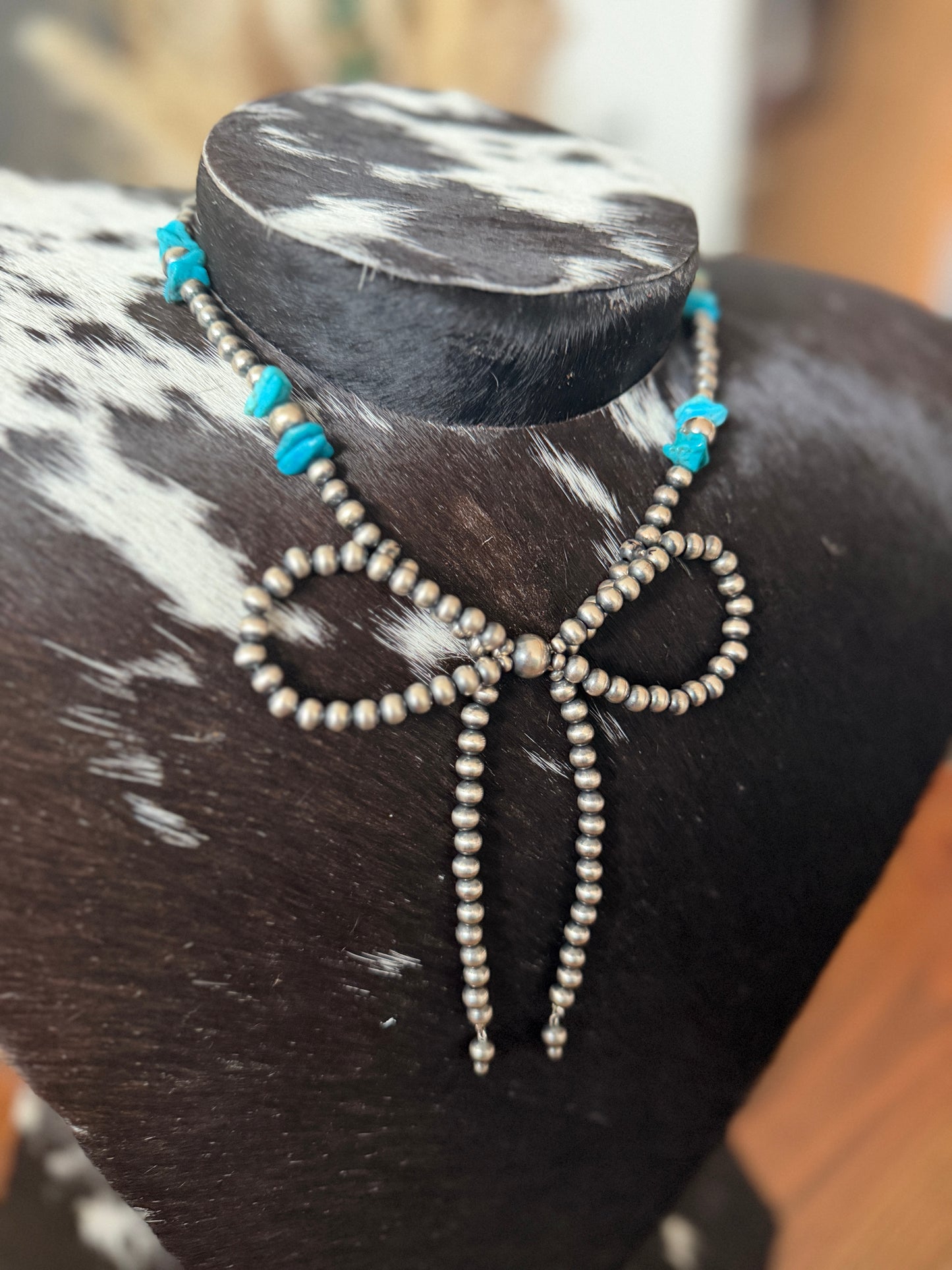 Product Title: Native Hand-Strung Kingman Turquoise & Sterling Silver Pearl Bow Necklace – Lucinda Sardo