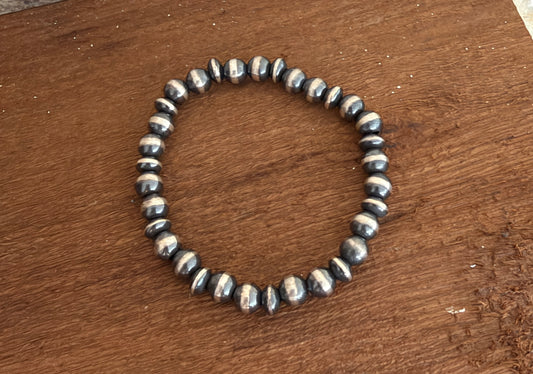 7mm Graduated 925 Sterling Silver Pearl Stretch Bracelet – Machine Made