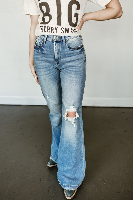Callie Super High Rise Distressed Flare Jeans