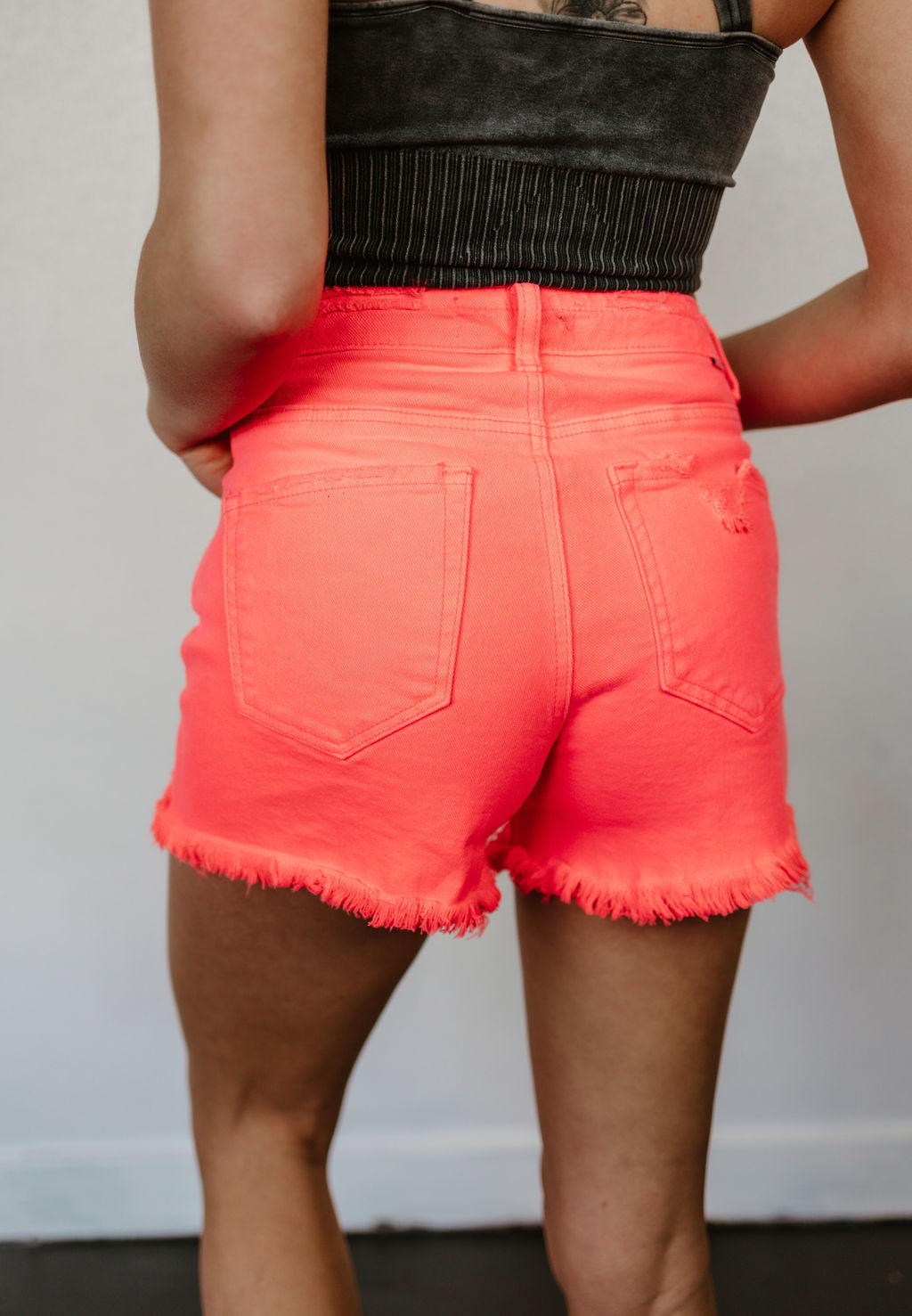 Statement High Rise Distressed Risen Shorts in Coral